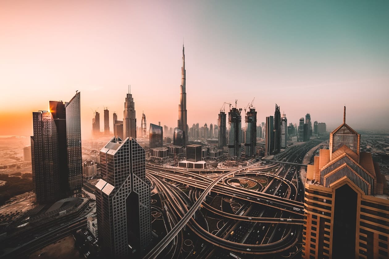Downtown Dubai skyline at night — Burj Khalifa illuminated against the city lights